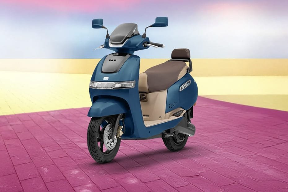 TVS iQube 2025 price, electric scooter EMI ₹2199, TVS iQube mileage range, TVS electric scooter launch, 1-hour charging EV, best EV scooter India, TVS iQube features, TVS iQube electric specs, iQube vs Ola S1 Pro, iQube 220KM range scooter, EV scooter under ₹2,500 EMI